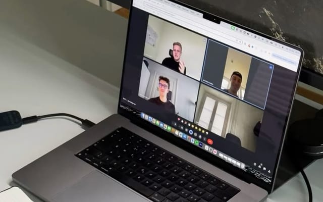 A live video call on a laptop — a Paxlan AI introductory session in progress.